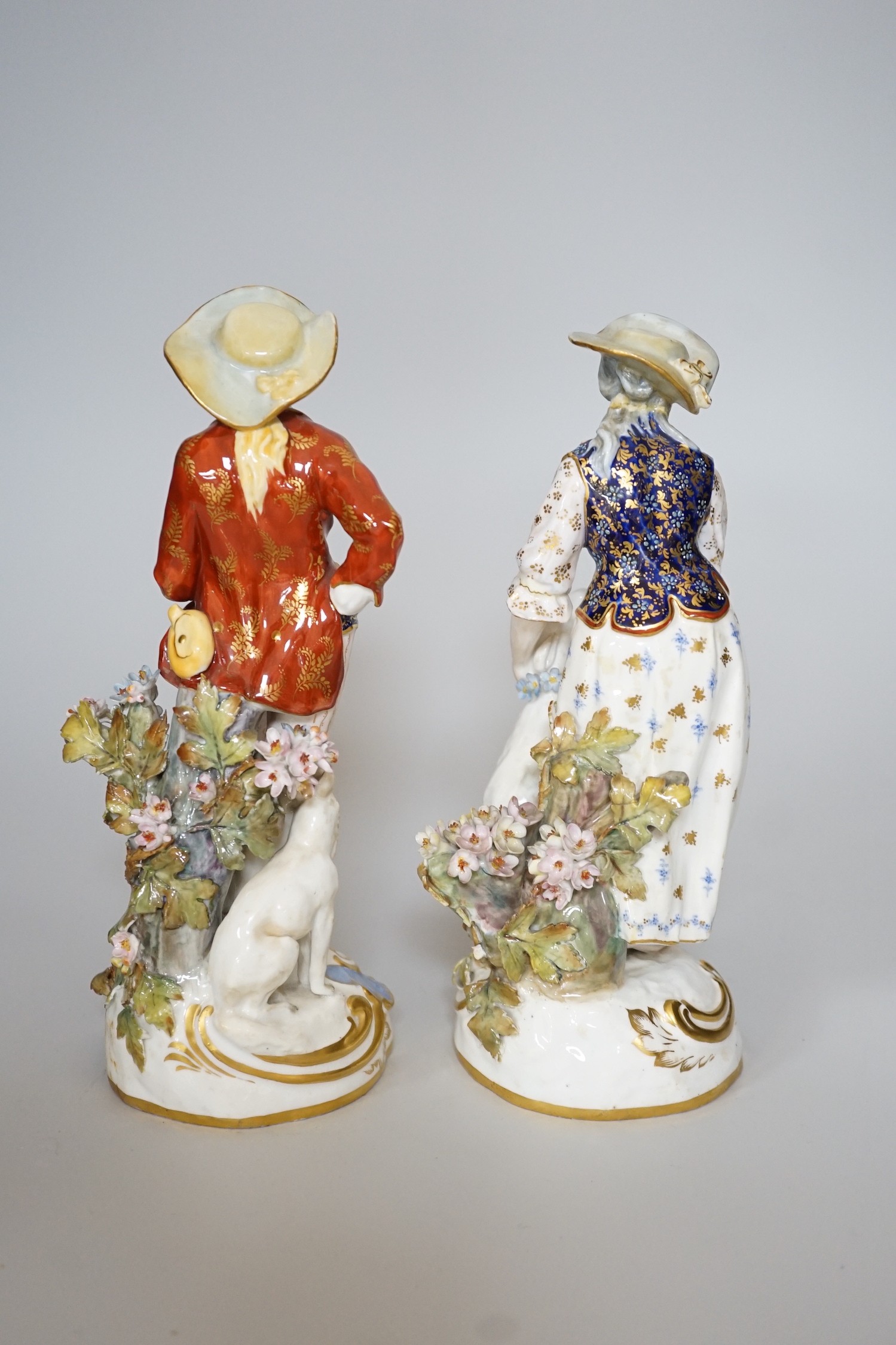 A pair of Royal Crown Derby figures of a Shepherd and shepherdess, 23cm